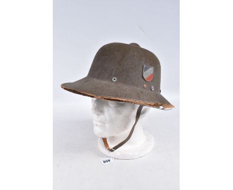 A 1942 DATED GERMAN ARIKACORPS PITH HELMET WITH DECALS, this is the olive green tropical sun hat with metal army and national