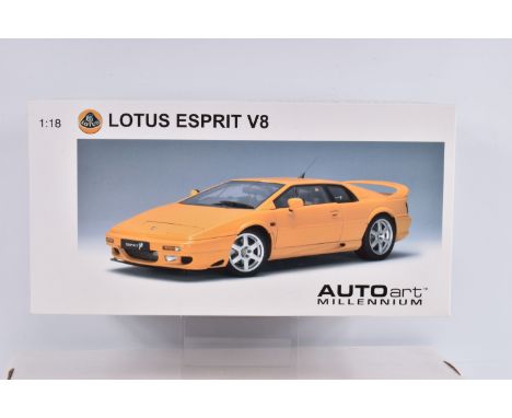 A BOXED AUTOART MILLENIUM 1:18 SCALE LOTUS ESPRIT V8 DIECAST MODEL VEHICLE, numbered 75313, in yellow, antenna still attached