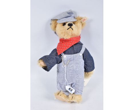 AN UNBOXED STEIFF LIMITED EDITION TEDDY BEAR 'Casey', from 1996, No.665134, golden plush mohair bear wearing U.S. train drive