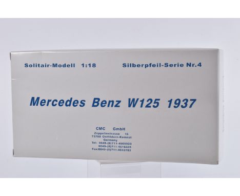 A BOXED CMC SOLITAIR MODELL 1:18 SCALE MERCEDES BENZ W125 1937 MODEL VEHICLE, numbered M-031, silver in colour, appears in ne