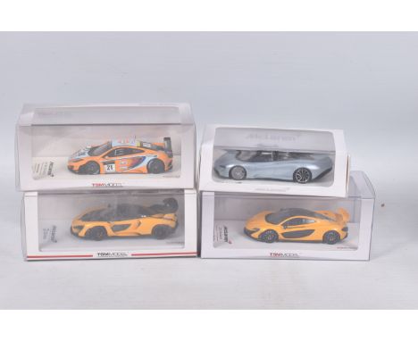 THREE BOXED TSM MODEL MCLAREN MODEL VEHICLES TOGETHER WITH ONE UNBRANDED MCLAREN MODEL, the first is an unbranded Mclaren Spe