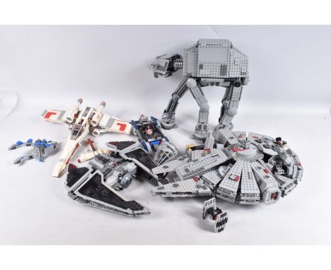 A QUANTITY OF LEGO STAR WARS CONSTRUCTED MODELS, to include a believed to be 7965 Millennium Falcon, a 75054 AT-AT, 30276 Fir