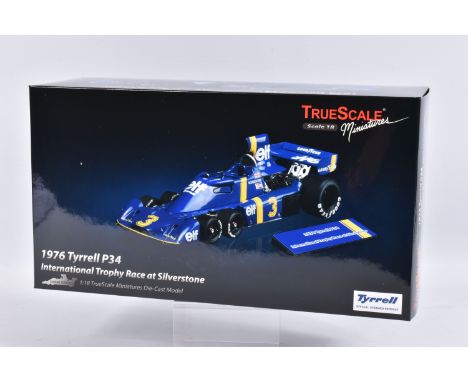 A BOXED TRUESCALE MINIATURES 1976 TYRRELL P34 INTERNATIONAL TROPHY RACE AT SILVERSTONE 1:18 SCALE DIECAST MODEL, numbered TSM