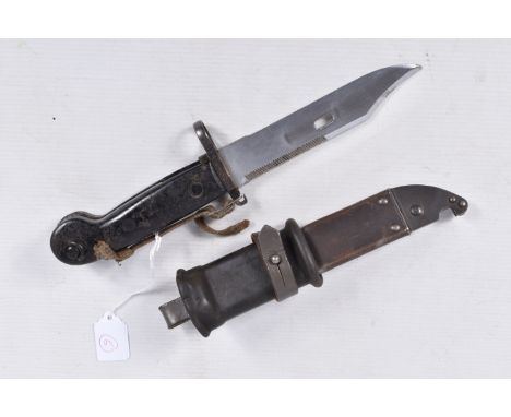 AN AK47 KALASHNIKOV BAYONET WITH WIRE CUTTER SCABBARD, it is in overall good condition but the handle grip has got some wear 