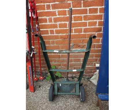 A sack barrow, tin trunk and contents etc