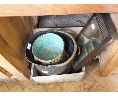 A copper coal helmet, brass planter and a small mirror contained in a wooden crate