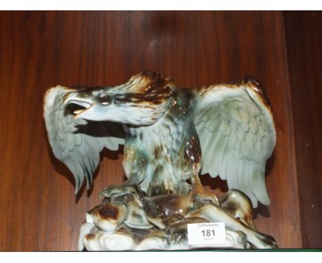 A CERAMIC BIRD OF PREY FIGURE N/R