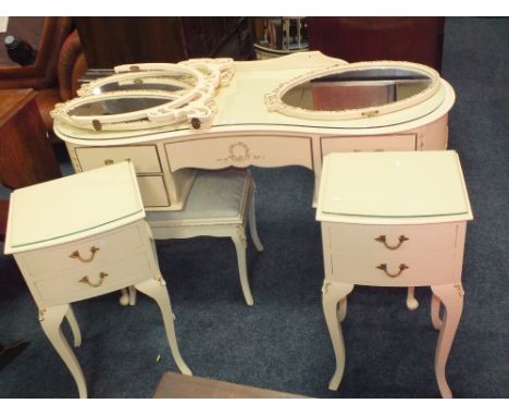 A VINTAGE CREAM KIDNEY SHAPED DRESSING TABLE WITH TRIPLE MIRROR &amp; STOOL&nbsp;WITH MATCHING BEDSIDES