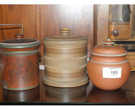 THREE ANTIQUE CERAMIC TOBACCO JARS