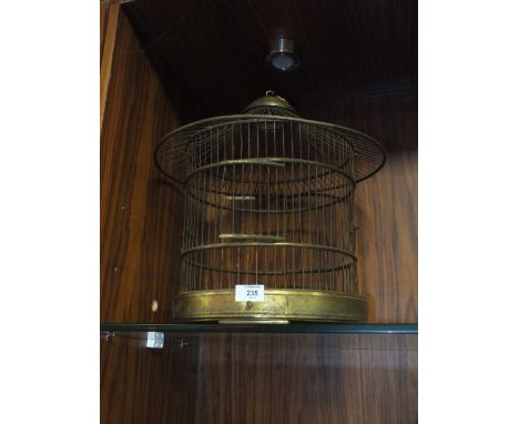 A SMALL VINTAGE CIRCULAR BRASS BIRD CAGE