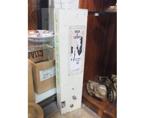 A VINTAGE CIGARETTE LIGHTER DISPENSER 