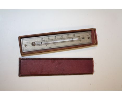 AN ANTIQUE TRAVEL THERMOMETER IN CASE