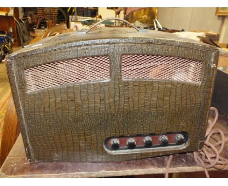A VINTAGE PORTABLE BOX TELEVISION 