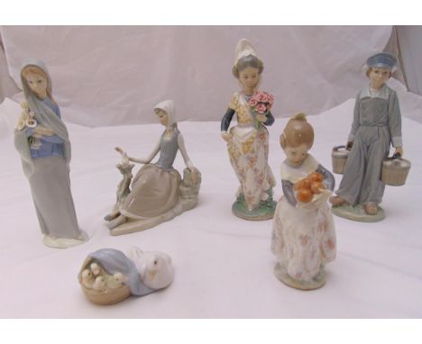 Six Lladro figurines of children and a group of ducks