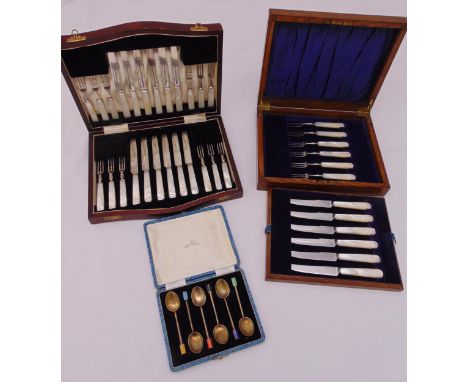 A cased set of Walker and Hall hallmarked silver and enamel coffee spoons, Birmingham 1924 and two cased sets of silver plate
