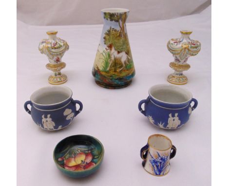 A quantity of porcelain to include vases, a pair of two handled bowls, a Moorcroft dish and a Royal Worcester miniature two h