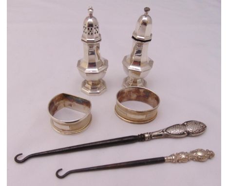 A quantity of hallmarked silver to include condiments, napkin rings and button hooks, approx weight of weighable silver 131g