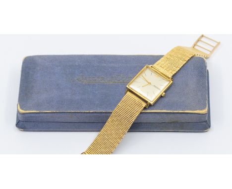 Jaeger Le Coultre- a gentleman's vintage  18ct gold cased wristwatch, comprising a signed square silvered split dial, case ap