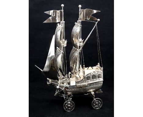 An Edwardian silver model of a nef ship, detailed with captain on deck with crew members in battle positions, cannons near bo