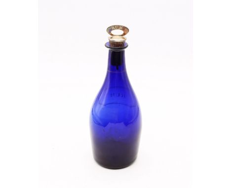 A George III / IV Bristol blue rum bottle, with etched stopper and original gilt decoration, having possible original ring sh