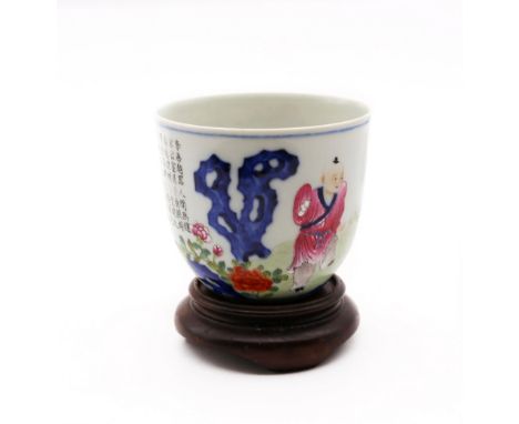 A Chinese porcelain chicken cup, Qianlong seal mark but late 20th century, approx. 7cm high x 8cm diameter, on wooden stand i