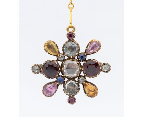 A 19th century harlequin stone set brooch, comprising a radial design set to the centre with a rose cut diamond approx 7mm, w