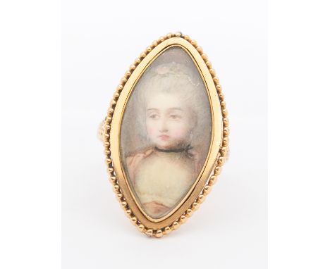 A late 18th century yellow gold navette shaped sentimental ring, set with a portrait miniature of a lady in a pink dress, bea