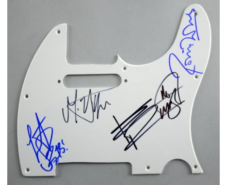 The Rolling Stones, a guitar scratch plate signed by four members of the English Rock Band including Mick Jagger, Keith Richa