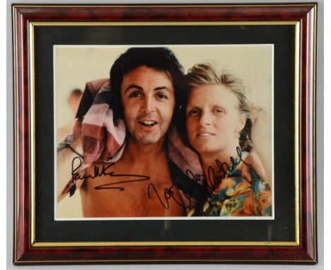 Paul & Linda McCartney, a colour photograph signed in black marker by Paul & Linda from their 'Wings' days, framed  Provenanc