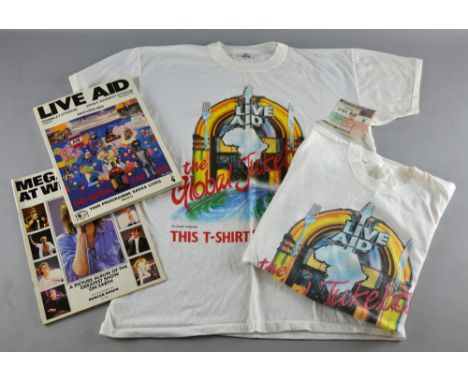 Live Aid Concert (1985), a ticket from the event with an official Live Aid programme, another programme & two t shirts  All i