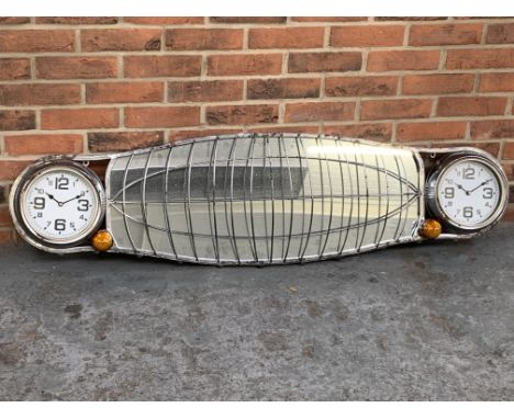 Wall Mirror &amp; Clock Modelled On A Car GrilleMake: Contact AuctioneerModel: Contact AuctioneerYear: 0Mileage: 0VIN: Contac