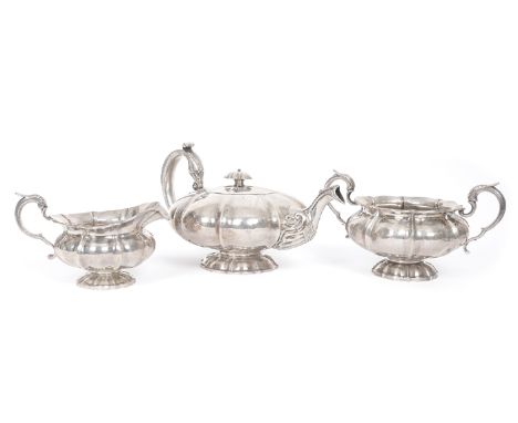 1830s Irish silver tea service. A William IV Irish silver three-piece melon shaped tea service, the lobed body mounted with c