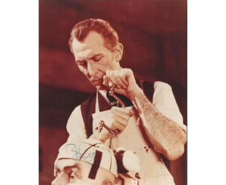 Peter Cushing autographed photo. Colour 8x10 photograph from a Hammer Horror film autographed by the late great Peter Cushing