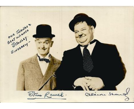 Laurel and Hardy autographed photo. Wonderfully rare 7 x 5 inch sepia classic portrait of the comedy double act Stan Laurel a