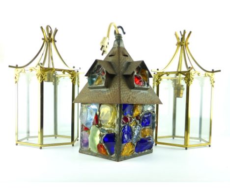 A pair of brass frame haxagonal hanging lanterns, glazed, 34cm H,and an exterior hanging lantern Hanzel and Gretel style cott