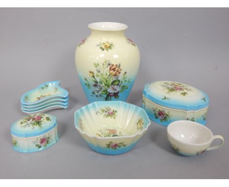 An extensive continental ceramic set of tableware banquet decoration, 26cm vase, storage jar (63 pieces)