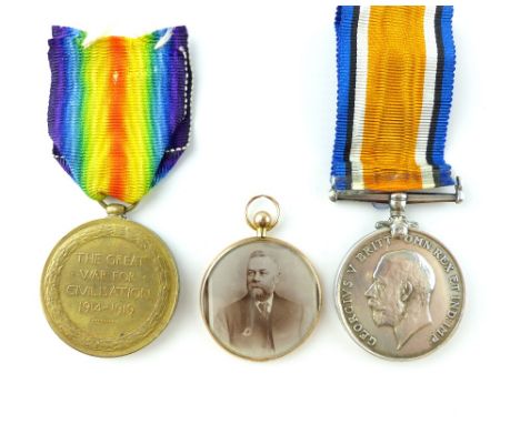 First World War medal pair awarded to PTE J Emmerson West York Regiment and a 9ct gold circular portrait pendant containing t