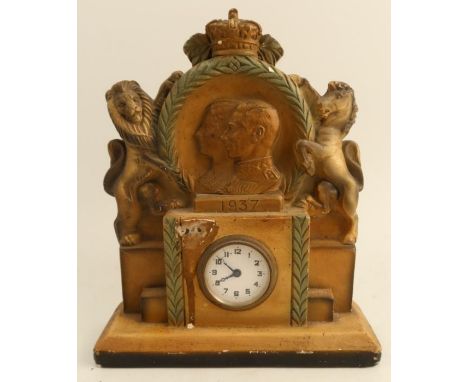 A plaster Royal Commemorative mantel clock, with portraits, dated 1937, height 10.5ins