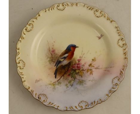 A Royal Worcester plate, decorated with a Chaffinch and foliage by E Barker, diameter 9ins