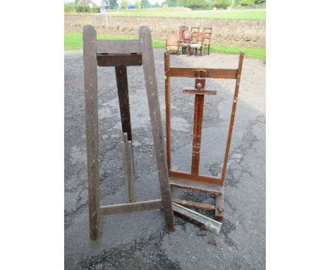 An adjustable easel, width 22ins, height 35ins together with another easel