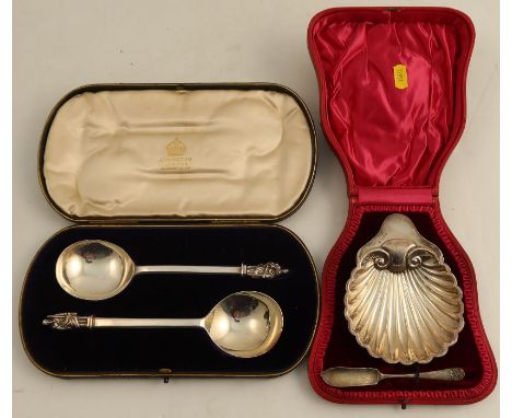 A cased pair of Elkington &amp; Co Apostle serving spoons, Birmingham 1906, together with a cased hallmarked silver shell but