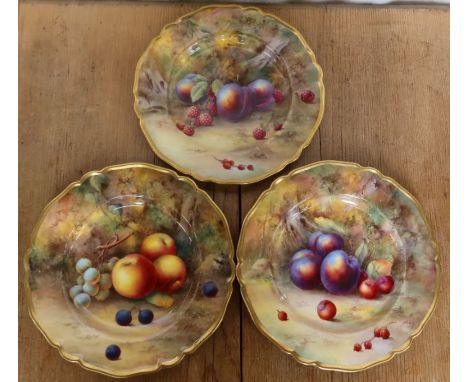 Three Royal Worcester plates, all decorated with fruit to a mossy background by H H Price, diameter 9ins - all very crazed, s