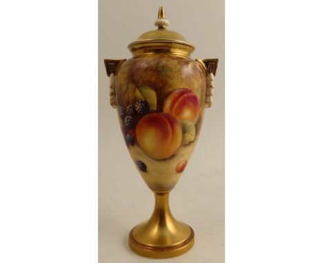 A Royal Worcester covered pedestal vase, decorated all around with fruit to a mossy background by S Weston, shape number 2713