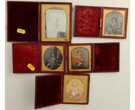 Four daguerreotypes, two of children , one of a man in army uniform and the other of a gentleman, all in fitted velvet lined 