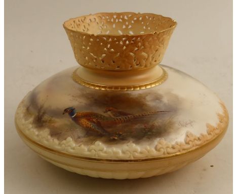 A Royal Worcester blush ivory squat vase, with pierced neck, the upper half of the body decorated with pheasants in landscape