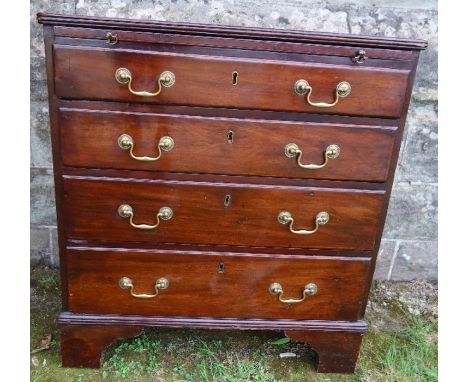 A mahogany chest of drawers, fitted with a brushing slide, having four graduated long drawers, raised on bracket feet, 750mm 
