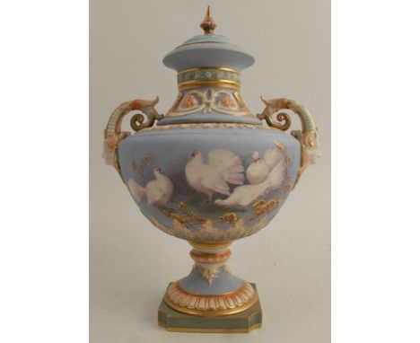 A Royal Worcester covered pedestal vase, decorated with doves by C H C Baldwyn, on a powder blue ground, with gilt and ivory 