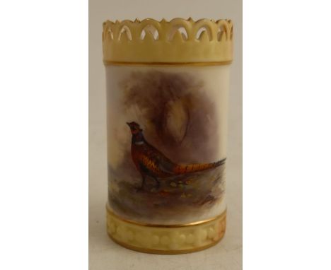 A Royal Worcester cylindrical vase, with pierced blush ivory neck, the body decorated to the front with a pheasant in landsca