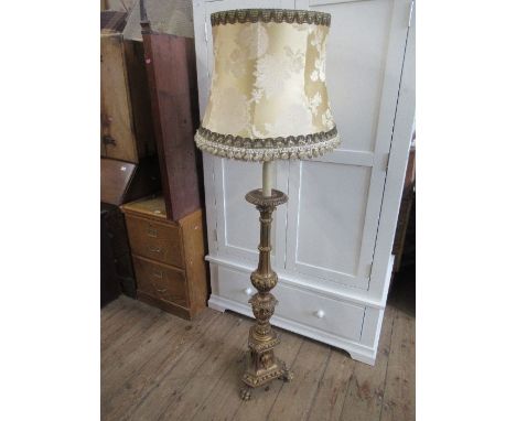 A converted Arts and Crafts style standard lamp