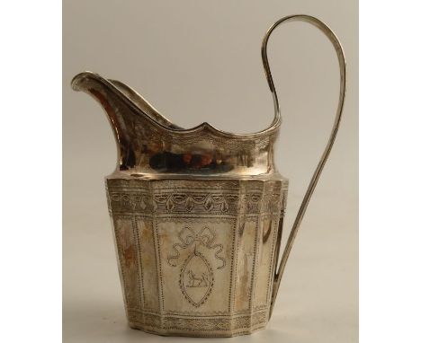 A Georgian Irish silver cream jug, with engraved decoration to the shaped body, weight 6oz&nbsp;